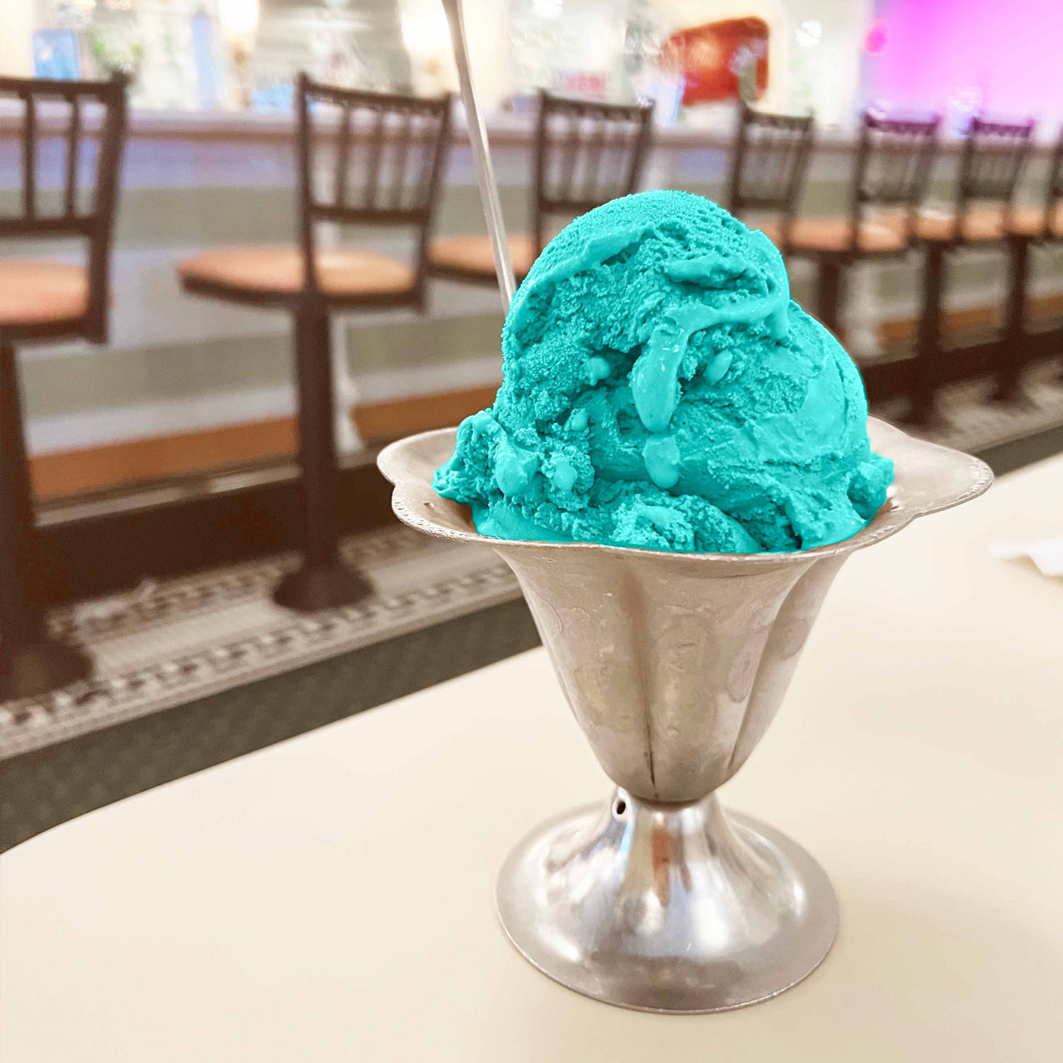 blue ice cream in a silver dish